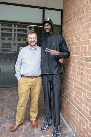 Legal Aid DC client Ricky McComb with his attorney Brian Rohal