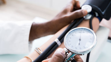 A patient gets their blood pressure taken